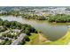 Aerial view showcasing the property's proximity to a large, attractive lake and lush surroundings at 206 Lake Brandt Dr, Cary, NC 27519