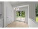 Bright dining area features a door to the backyard at 206 Lake Brandt Dr, Cary, NC 27519