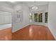 Bright dining area with hardwood floors and lots of natural light from a large bay window at 206 Lake Brandt Dr, Cary, NC 27519