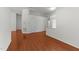 Bright hallway with white walls, white door and wood flooring at 206 Lake Brandt Dr, Cary, NC 27519