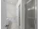 Bright bathroom showcases a jacuzzi tub, glass-door shower, and access to a dual sink vanity for a spa-like experience at 206 Lake Brandt Dr, Cary, NC 27519