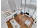 Striking living room with soaring ceilings, fireplace, built-ins and an open layout with large windows at 2224 Narrawood St, Raleigh, NC 27614