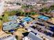 Aerial view of community tennis courts, showcasing well-maintained facilities and ample parking at 2224 Narrawood St, Raleigh, NC 27614