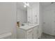 Bright bathroom features a modern vanity with ample storage, and a stylish mirror at 2225 Millbank Village Ct # 101, Raleigh, NC 27610