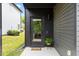 Stylish black front door with glass and a welcoming entrance, featuring modern design elements at 2225 Millbank Village Ct # 101, Raleigh, NC 27610