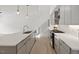 Modern kitchen with stainless steel appliances, quartz countertops, and sleek gray cabinetry at 2225 Millbank Village Ct # 101, Raleigh, NC 27610