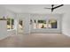 Bright living room with multiple windows, hardwood floors, and modern design at 2225 Millbank Village Ct # 101, Raleigh, NC 27610