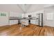 Well-appointed kitchen featuring stainless steel appliances and a center island at 225 East End Ave, Durham, NC 27703