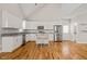 Modern kitchen with stainless steel appliances and granite countertops at 225 East End Ave, Durham, NC 27703
