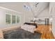 Spacious living room featuring high ceilings and hardwood floors, open to kitchen at 225 East End Ave, Durham, NC 27703