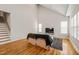 Hardwood floors and a sofa in the spacious living room area at 225 East End Ave, Durham, NC 27703