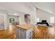 Open concept living area with hardwood floors, kitchen and dining combined at 225 East End Ave, Durham, NC 27703