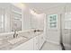 Beautiful primary bathroom with double vanity, granite countertops, and a spacious walk-in shower at 225 East End Ave, Durham, NC 27703
