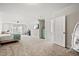 Spacious bedroom featuring neutral colors, carpet, and multiple windows for lots of natural light at 2256 Toad Hollow Trl, Apex, NC 27502