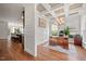 Stylish office with hardwood floors, trey ceiling, decor molding, and views of the gourmet kitchen at 2256 Toad Hollow Trl, Apex, NC 27502