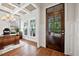 Office featuring hardwood floors, natural light, trey ceiling, and decorative molding offers a bright workspace at 2256 Toad Hollow Trl, Apex, NC 27502