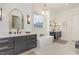 Beautiful bathroom featuring a freestanding tub, modern fixtures, and dual vanities at 2328 Sanctuary Dr, Raleigh, NC 27606