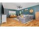 Inviting living room with hardwood floors, stylish furnishings, and a ceiling fan, creating a comfortable atmosphere at 2328 Sanctuary Dr, Raleigh, NC 27606