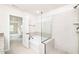 Bright bathroom featuring a tub and glass enclosed shower at 2619 Bordwell Grant Dr, New Hill, NC 27562