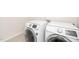 Laundry room featuring new Samsung washer and dryer machines at 2619 Bordwell Grant Dr, New Hill, NC 27562