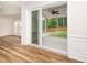 Covered outdoor patio with ceiling fan and screen, accessible through sliding glass doors at 2619 Bordwell Grant Dr, New Hill, NC 27562