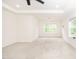 Neutral colored room with neutral carpeting, recessed lighting, baseboards, and a window at 2619 Bordwell Grant Dr, New Hill, NC 27562