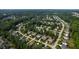 Panoramic aerial view of a residential neighborhood with lush trees at 2661 Silver Bend Dr, Apex, NC 27539