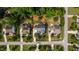 Aerial view of the home with driveway and landscaping among other homes at 2661 Silver Bend Dr, Apex, NC 27539