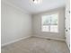 Neutral bedroom with carpet and a window at 2661 Silver Bend Dr, Apex, NC 27539