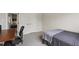 Comfortable bedroom featuring neutral decor, a single bed, and a glimpse into another room at 2661 Silver Bend Dr, Apex, NC 27539