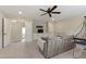 Entertainment room featuring a large TV, comfortable couch, and recessed lighting at 2661 Silver Bend Dr, Apex, NC 27539