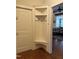 Entryway with white built-in bench and coat hooks at 2661 Silver Bend Dr, Apex, NC 27539