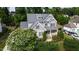 Beautiful two-story home with manicured landscaping and a gray color scheme at 2661 Silver Bend Dr, Apex, NC 27539
