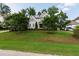 Charming two-story home with manicured lawn and mature trees at 2661 Silver Bend Dr, Apex, NC 27539