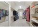 This walk-in closet features custom shelving and ample storage for clothing and accessories at 2661 Silver Bend Dr, Apex, NC 27539