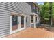 Spacious wooden back deck with access to backyard and view of bay window at 2708 Halfhitch Trl, Raleigh, NC 27615