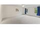Neutral bedroom with carpeted floors, ceiling fan, and two bright windows at 2708 Halfhitch Trl, Raleigh, NC 27615