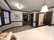 Open kitchen with white countertops, tile floors, and a view of the living room at 2708 Halfhitch Trl, Raleigh, NC 27615
