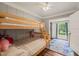 Shared bedroom with bunk beds and a doorway to another room at 2815 Orange Grove Rd, Hillsborough, NC 27278