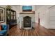 Close-up of a brick fireplace with a wood-burning stove, creating a warm and inviting ambiance at 2815 Orange Grove Rd, Hillsborough, NC 27278