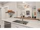 Kitchen with a large sink, white countertops, and an open view to the dining area at 2815 Orange Grove Rd, Hillsborough, NC 27278