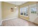 Cozy dining area with large window and door to the backyard at 2845 Bennington Dr, Clayton, NC 27520