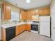 Bright kitchen featuring wood cabinets, modern appliances, and a functional layout at 2845 Bennington Dr, Clayton, NC 27520