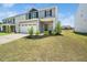Beautiful exterior view of a modern home with a well-manicured lawn and landscaping at 304 Azalea Gaze Dr, Youngsville, NC 27596