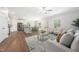 Open-concept living area with kitchen, dining, and comfortable seating, perfect for Gathering gatherings at 304 Azalea Gaze Dr, Youngsville, NC 27596