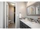 Modern bathroom features updated vanity and fixtures, with a shower and toilet in the background at 308 E Quailwood Dr, Fuquay Varina, NC 27526