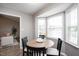 Cozy breakfast nook filled with natural light and a view to the living room at 308 E Quailwood Dr, Fuquay Varina, NC 27526