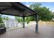 View of the gazebo on the deck, with an additional storage shed in the backyard at 308 E Quailwood Dr, Fuquay Varina, NC 27526