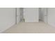 Bedroom featuring neutral carpet, a double door, and view into an adjoining room at 324 Farrow Glen Loop, Cary, NC 27519