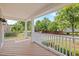 Inviting front porch offers ample seating and scenic views of the neighborhood at 324 Farrow Glen Loop, Cary, NC 27519